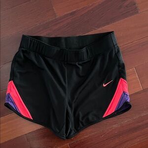 Nike Women's Black Athletic Shorts with Pink and Purple Highlights